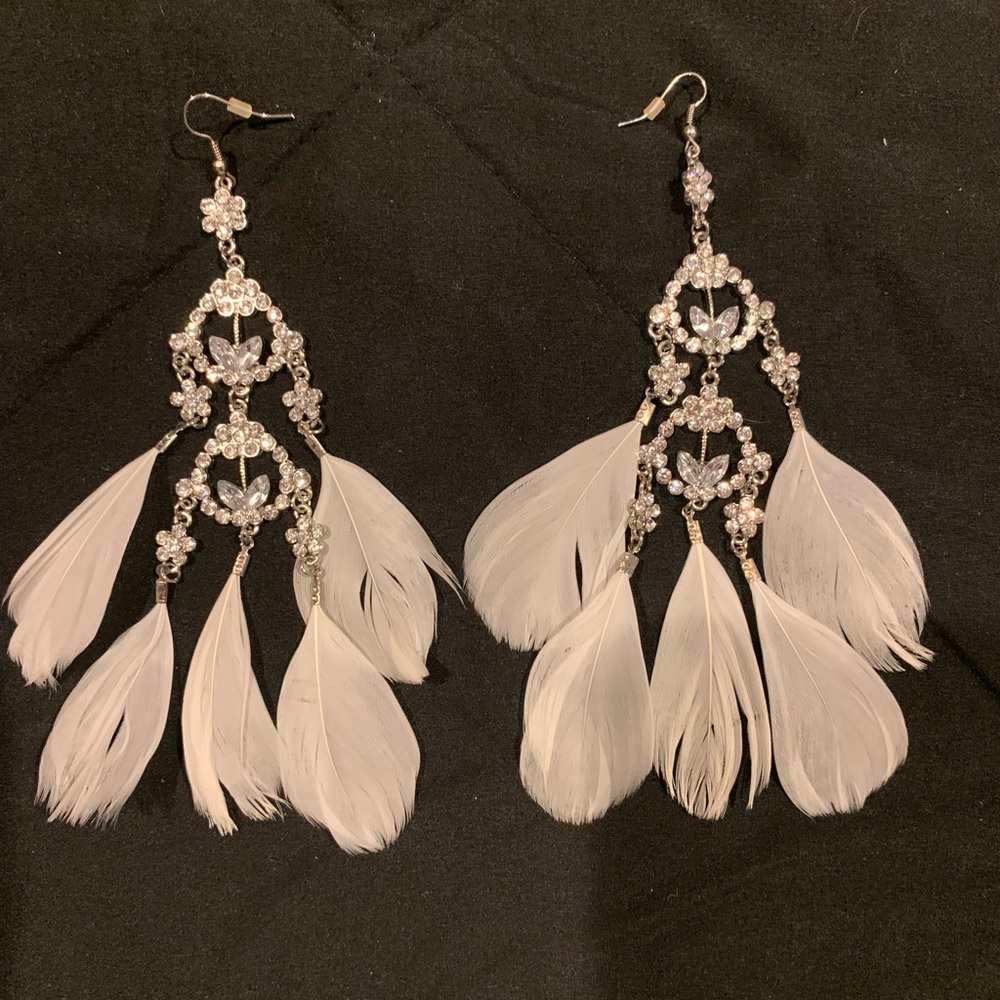White feathered earrings